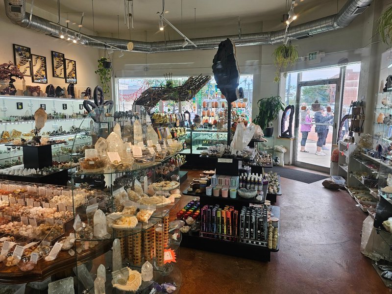 Shop Interior where a vast array of crystals can be seen including Raw amethyst geode portals