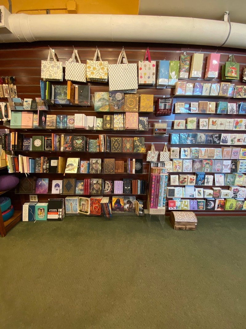 Wall display of other spiritual items such as cards and books