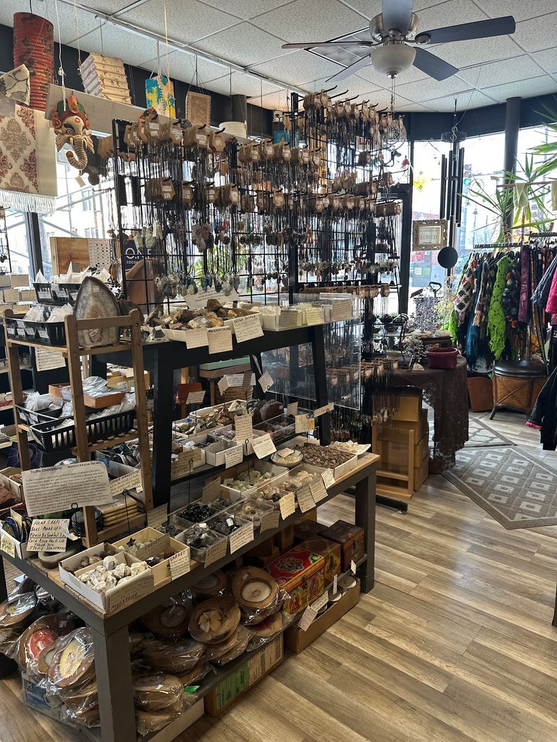 Interior showing a collection of crystals, crystal and bead necklaces and spiritual wares
