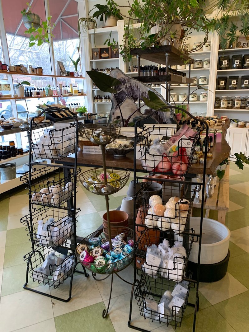 Selection of healing crystals, tumbled stones, and decorative mineral pieces