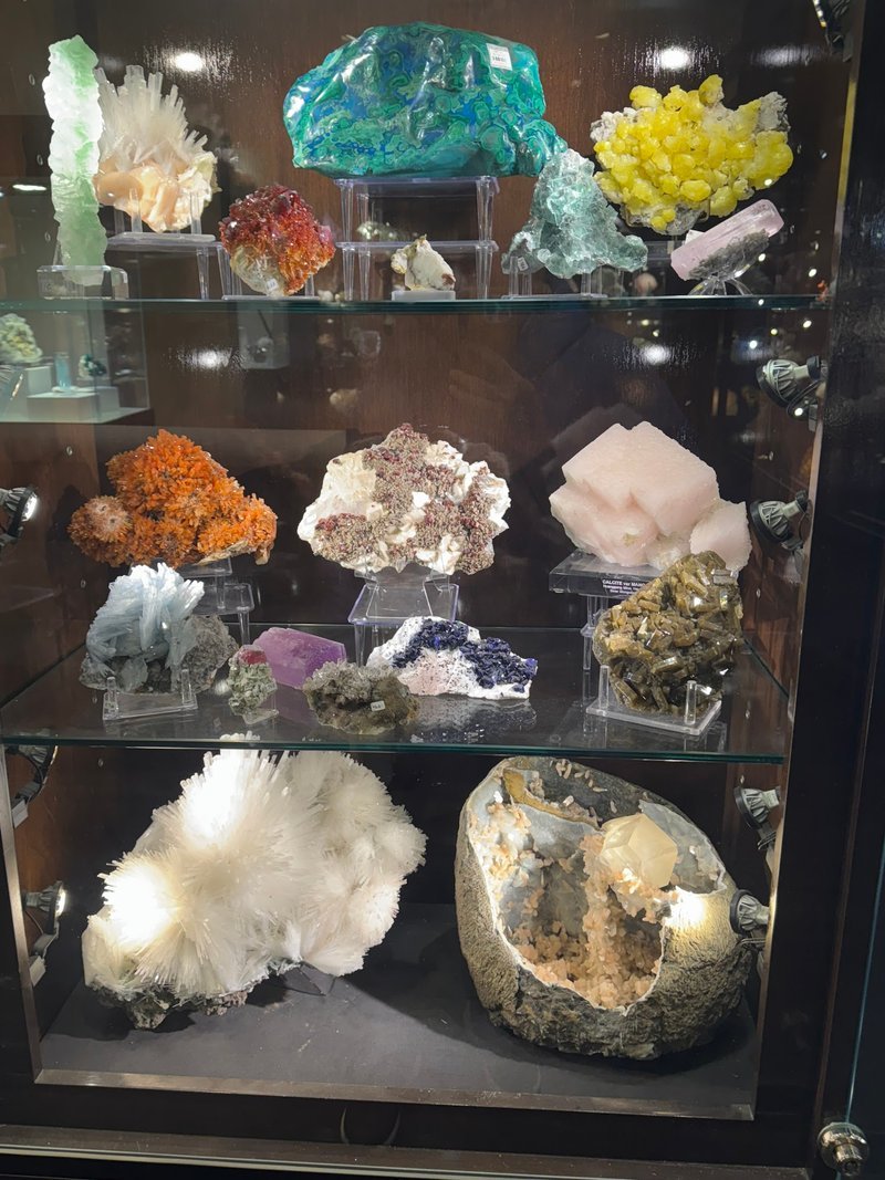 Selection of healing crystals, tumbled stones, and decorative mineral pieces