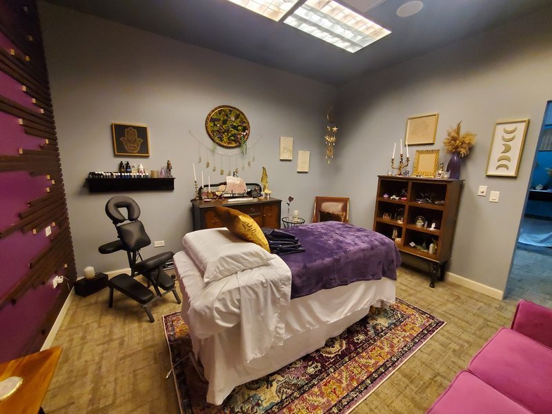 Shop interior featuring gemstones, healing crystals, and spiritual products