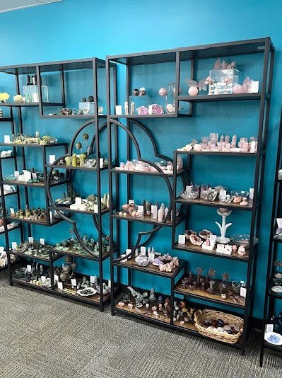 Crystal and mineral specimens including quartz, amethyst, and calcite varieties