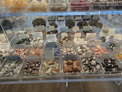 Assortment of crystal towers, spheres, clusters, and polished gemstones