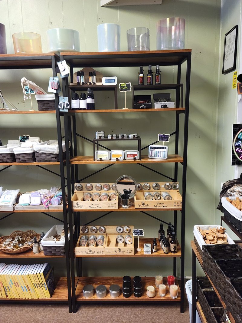 Display of polished crystal specimens, geodes, and mineral towers