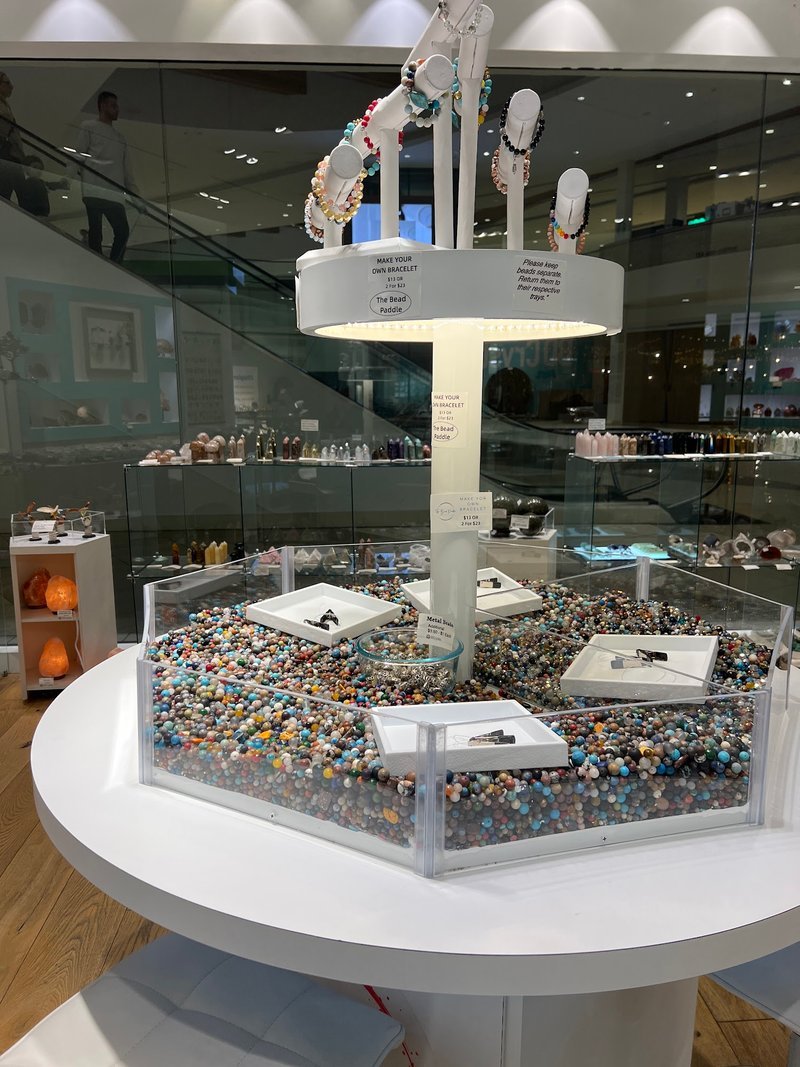 Crystal and mineral specimens including quartz, amethyst, and calcite varieties