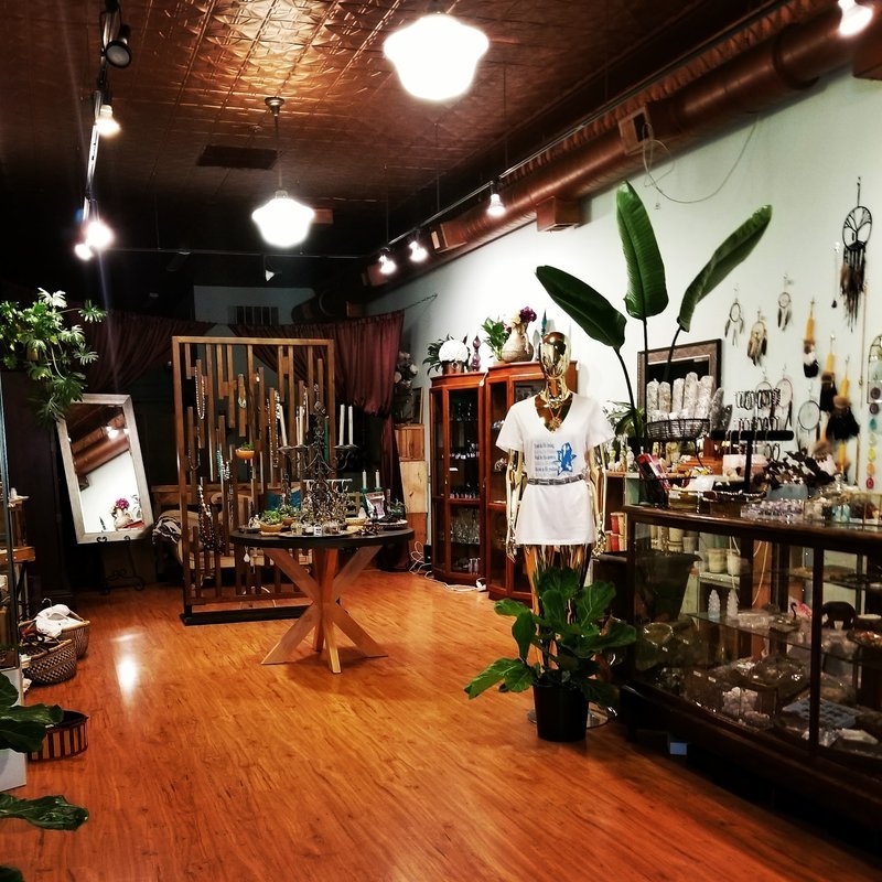 Organized crystal display with labeled stones and healing minerals
