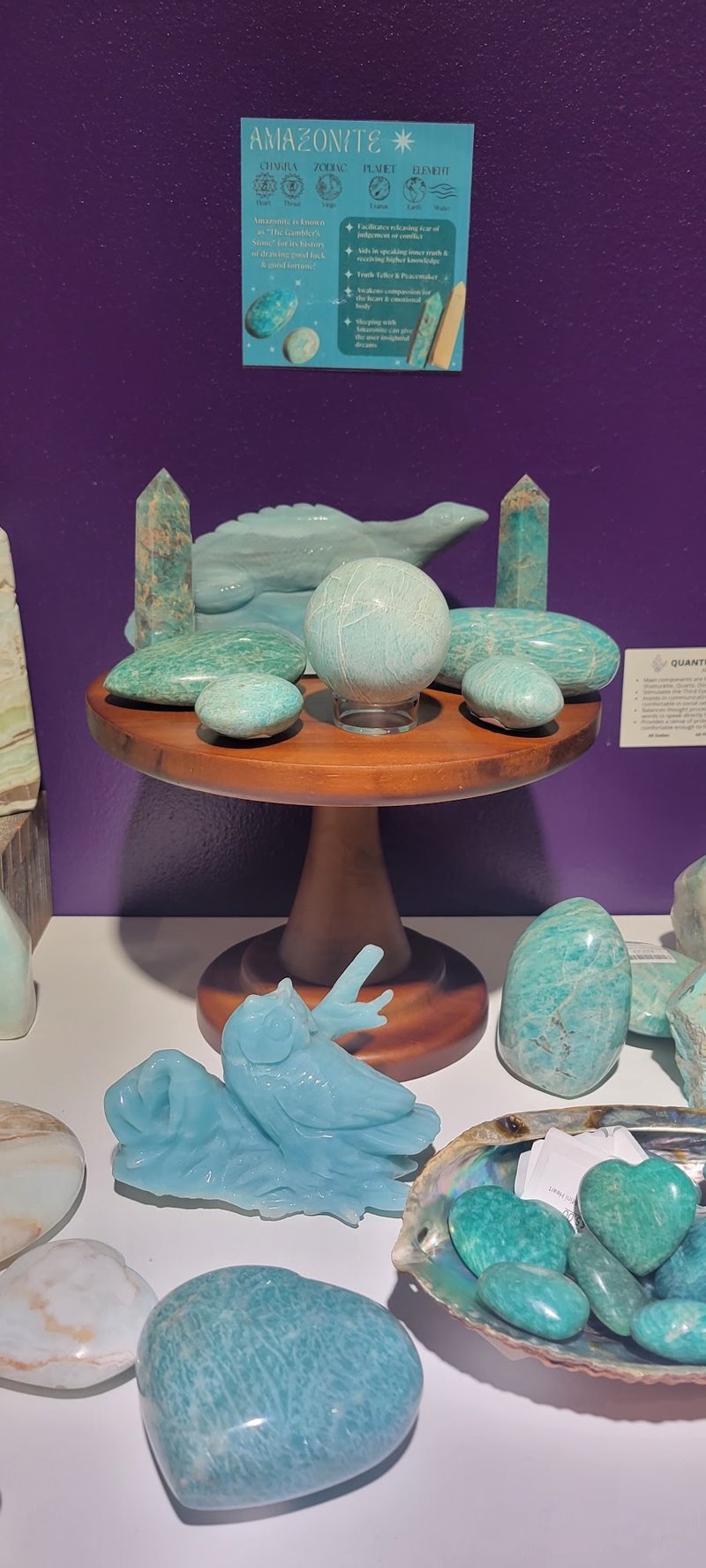 Selection of healing crystals, tumbled stones, and decorative mineral pieces