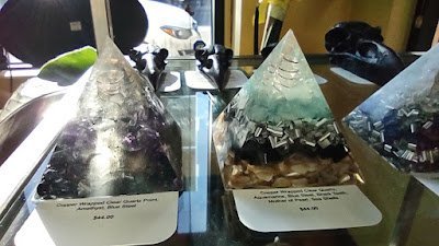Collection of raw crystals, polished stones, and unique mineral formations