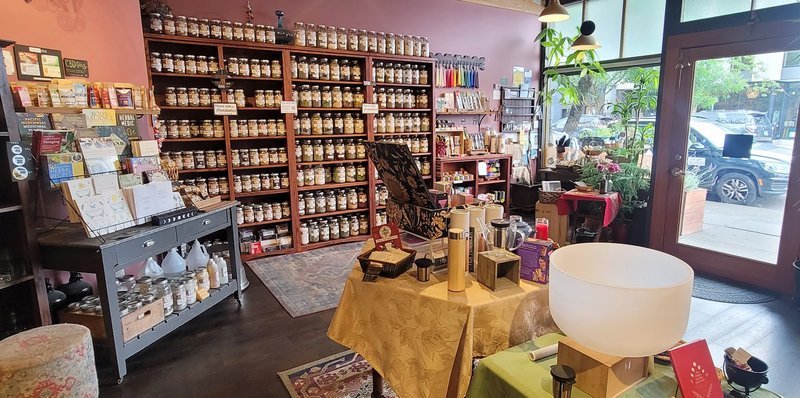 Organized crystal display with labeled stones and healing minerals