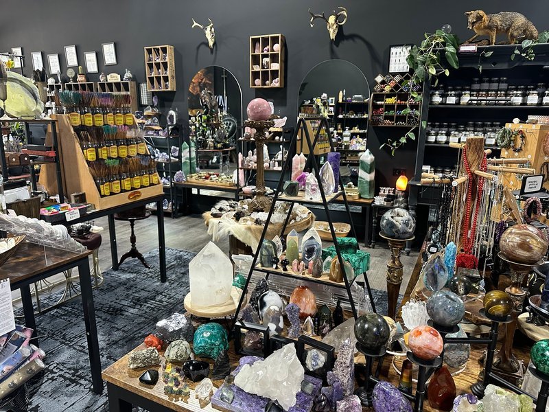 Store interior displaying crystals, minerals, and metaphysical supplies