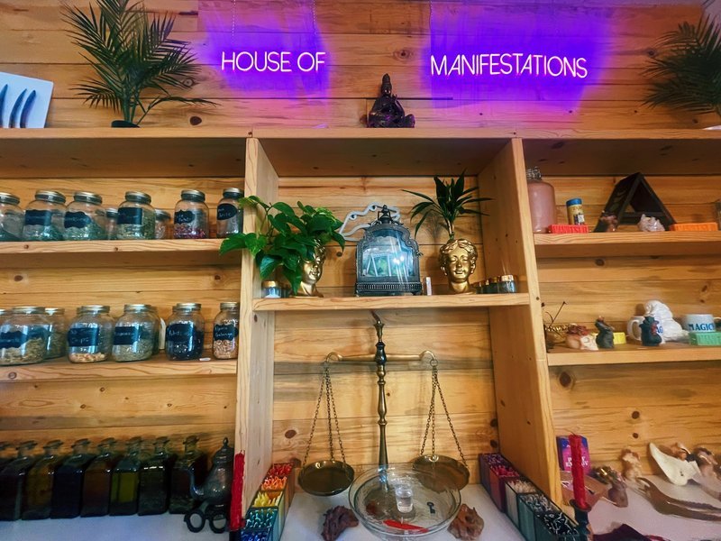 Retail display with tumbled stones, raw crystals, and polished specimens
