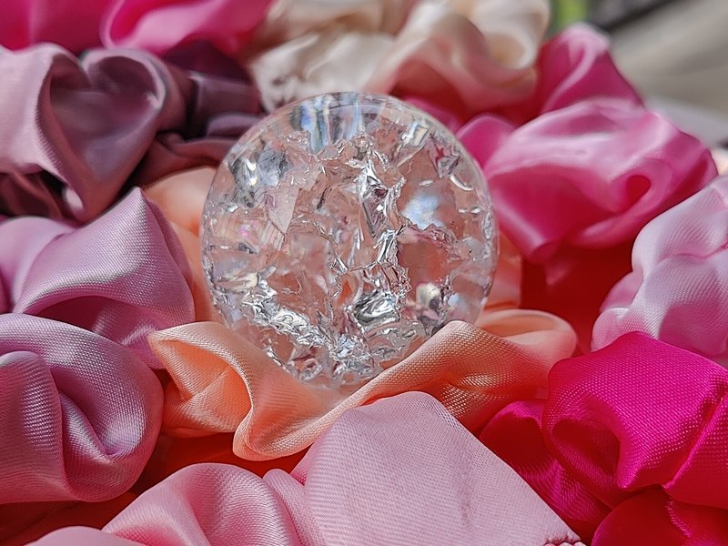 Organized crystal display with labeled stones and healing minerals