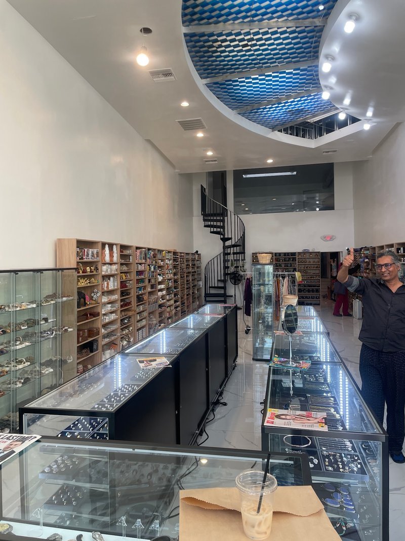 Organized crystal display with labeled stones and healing minerals