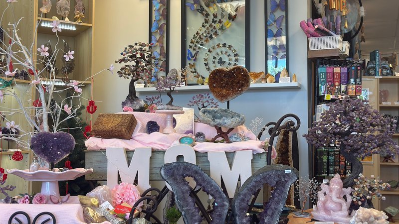 Store interior displaying crystals, minerals, and metaphysical supplies
