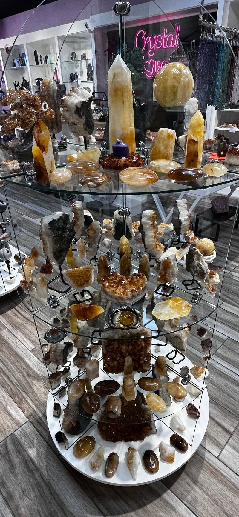 Selection of healing crystals, tumbled stones, and decorative mineral pieces