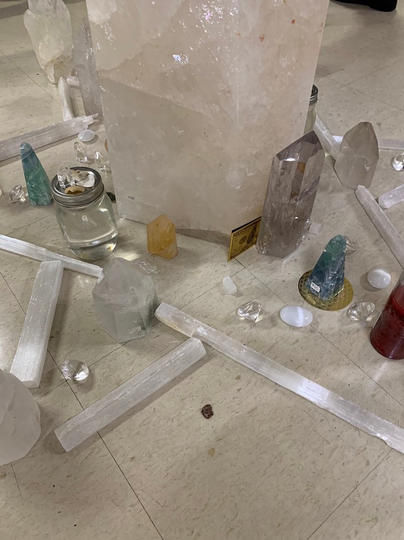 Selection of healing crystals, tumbled stones, and decorative mineral pieces