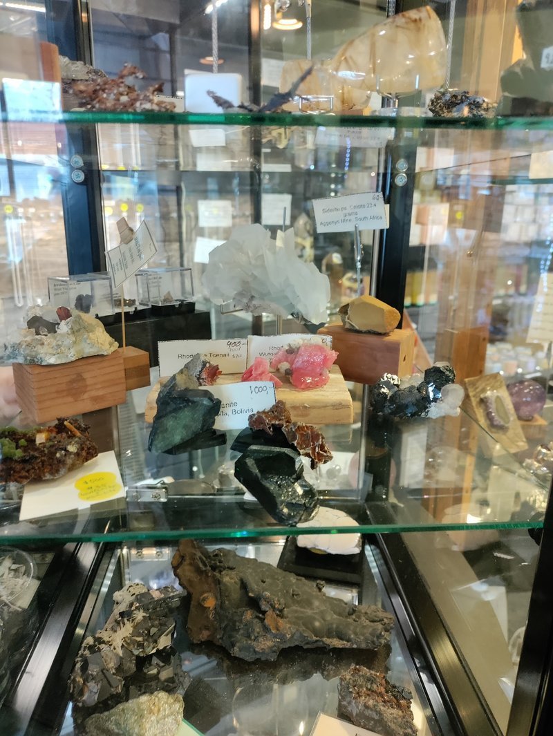 Store interior displaying crystals, minerals, and metaphysical supplies