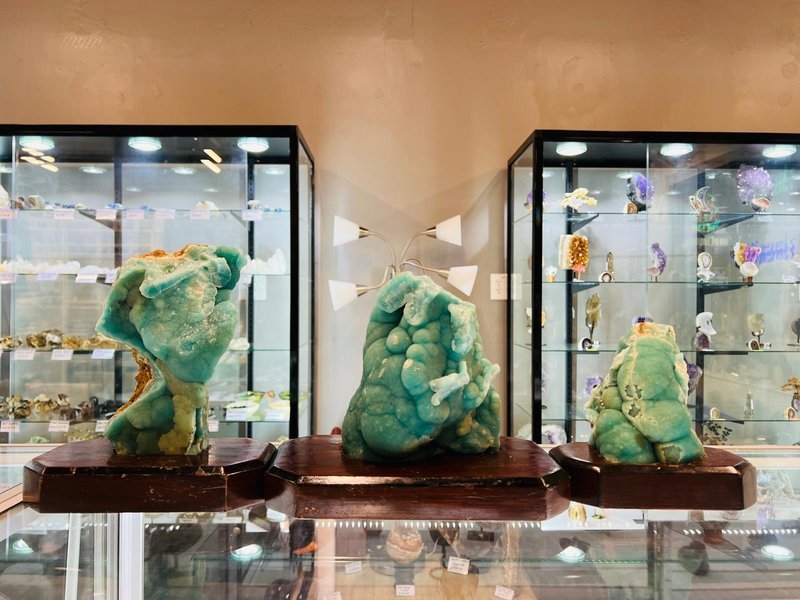 Shop interior featuring gemstones, healing crystals, and spiritual products