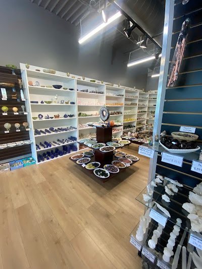 Assortment of crystal towers, spheres, clusters, and polished gemstones