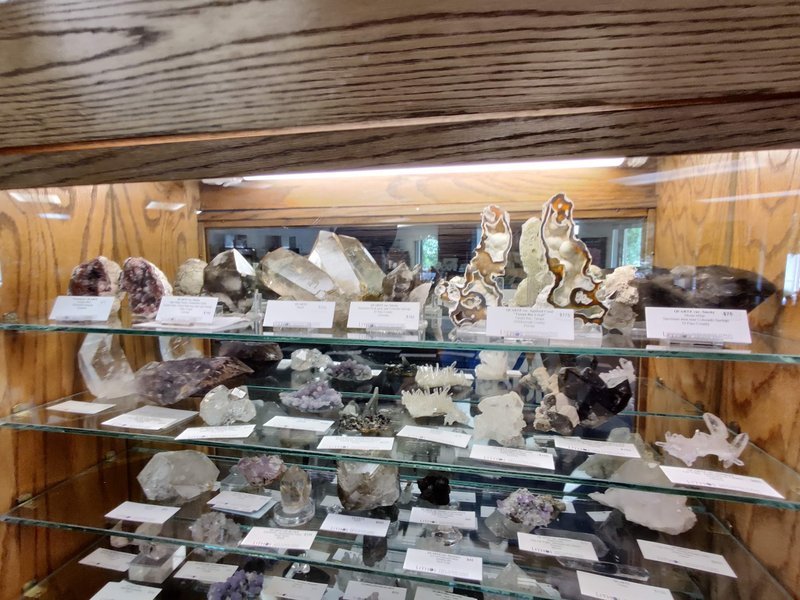 Shop interior featuring gemstones, healing crystals, and spiritual products