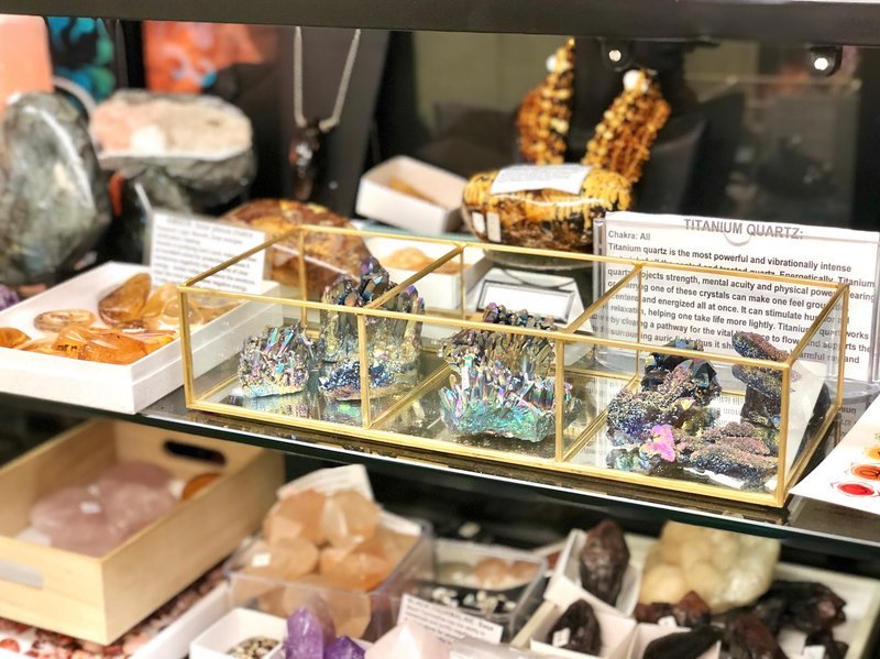 Store interior displaying crystals, minerals, and metaphysical supplies