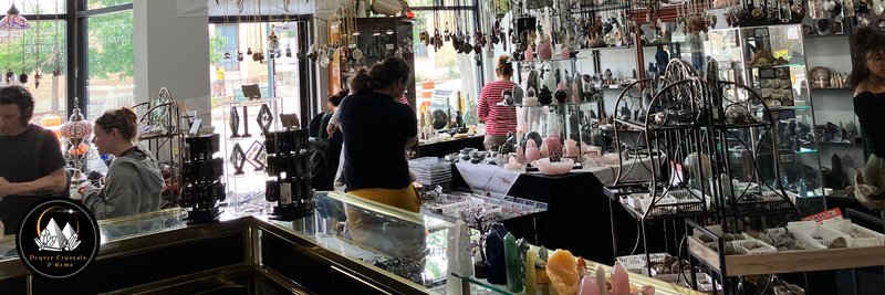 Interior view showcasing crystal towers, spheres, and carved stone pieces