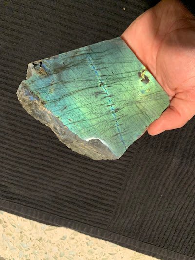 Shop interior featuring gemstones, healing crystals, and spiritual products