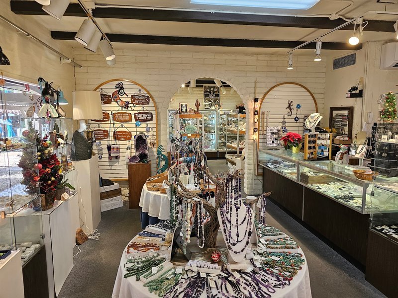 Interior view showcasing crystal towers, spheres, and carved stone pieces