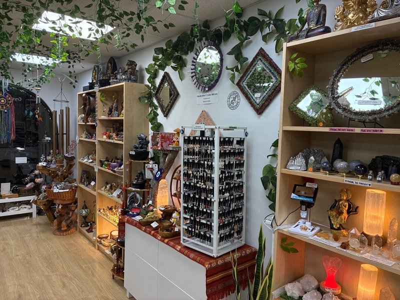 Retail display with tumbled stones, raw crystals, and polished specimens