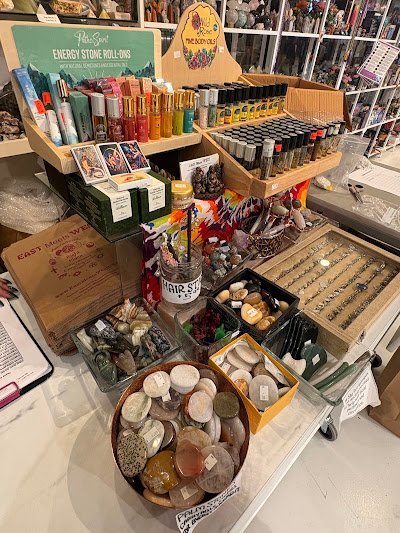 Store interior displaying crystals, minerals, and metaphysical supplies