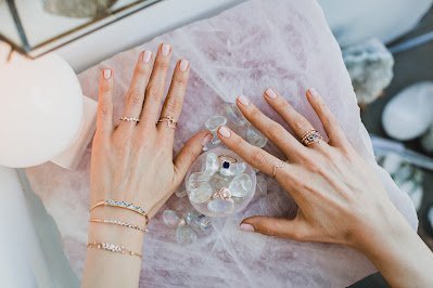 Retail display with tumbled stones, raw crystals, and polished specimens