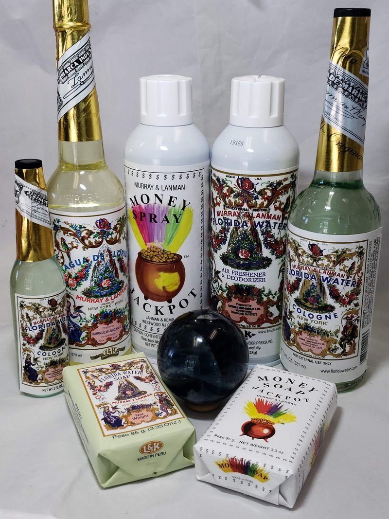 Variety of gemstones, crystal carvings, and polished mineral specimens