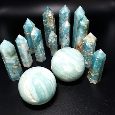 Assortment of crystal towers, spheres, clusters, and polished gemstones