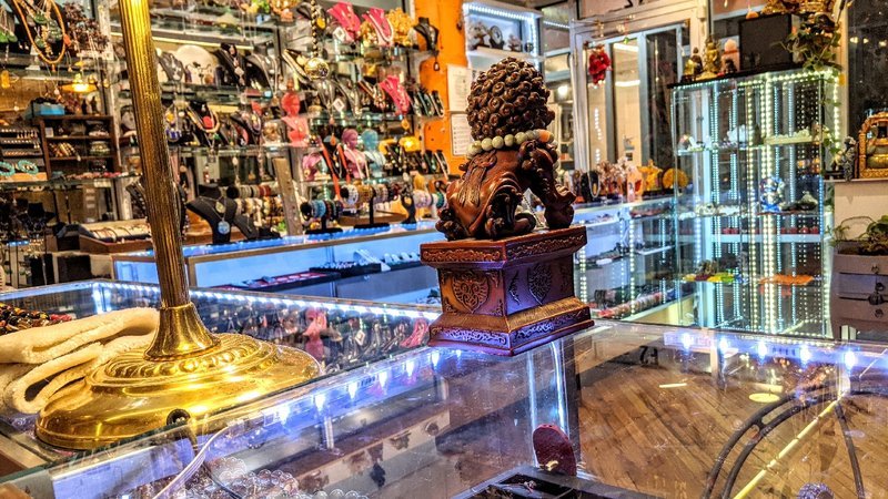 Interior view showcasing crystal towers, spheres, and carved stone pieces