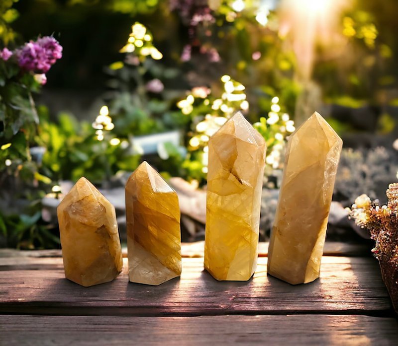 Display featuring crystal points, polished stones, and raw mineral specimens