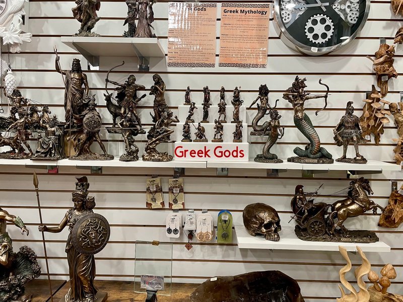 Retail display with tumbled stones, raw crystals, and polished specimens
