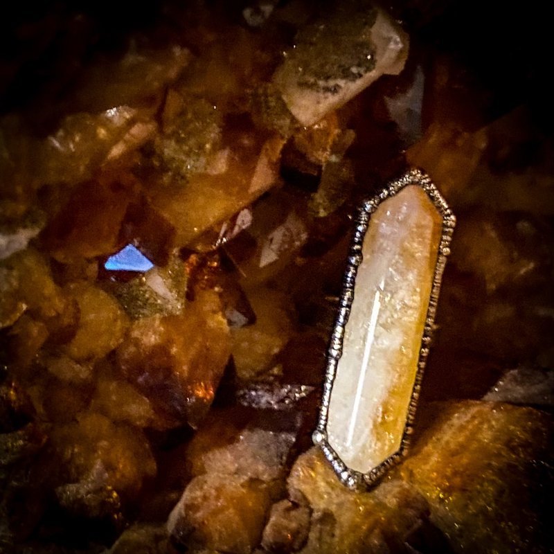 Crystal and mineral specimens including quartz, amethyst, and calcite varieties