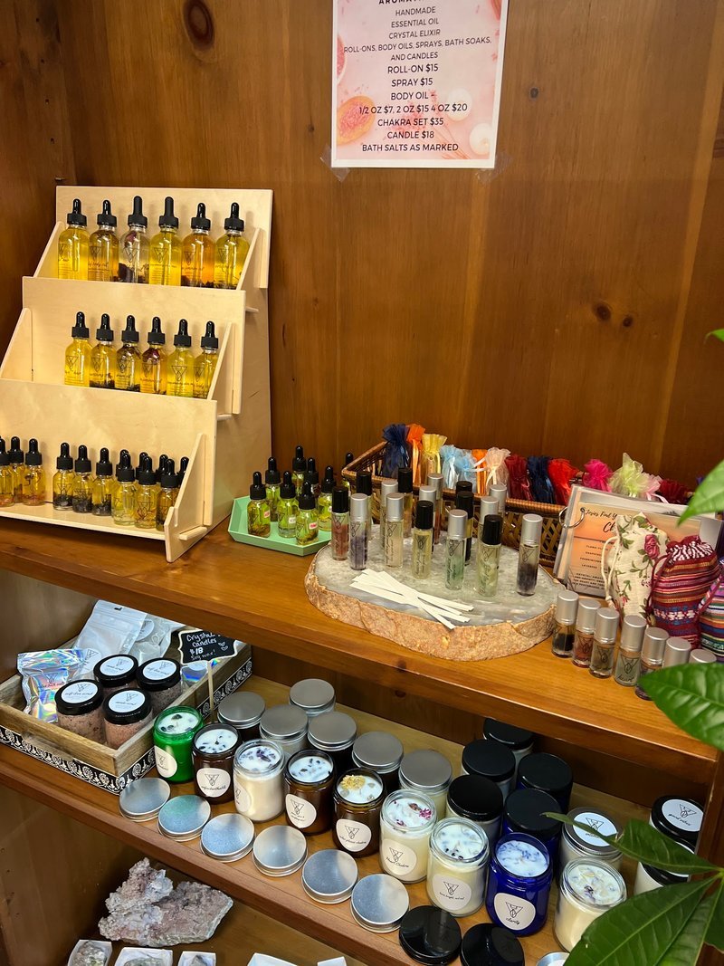 Shop interior featuring gemstones, healing crystals, and spiritual products