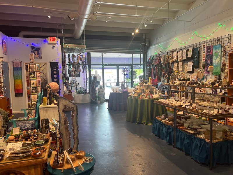 Store interior displaying crystals, minerals, and metaphysical supplies