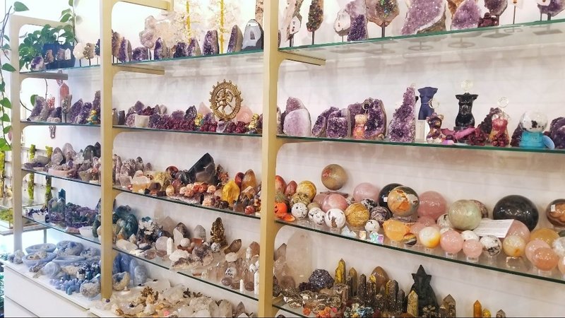 Crystal and mineral display with organized specimens and inventory