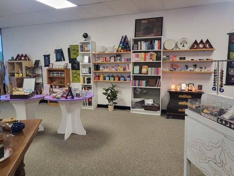 Display of polished crystal specimens, geodes, and mineral towers