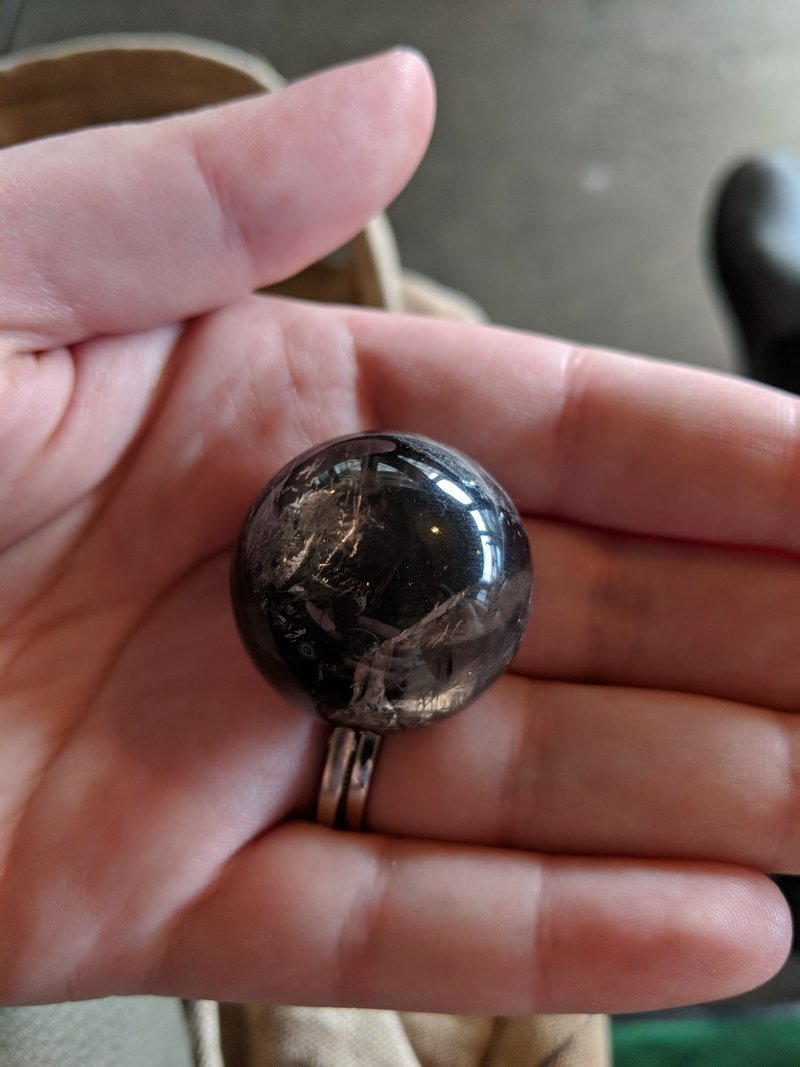 Interior view showcasing crystal towers, spheres, and carved stone pieces