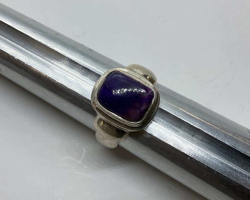 Variety of gemstones, crystal carvings, and polished mineral specimens