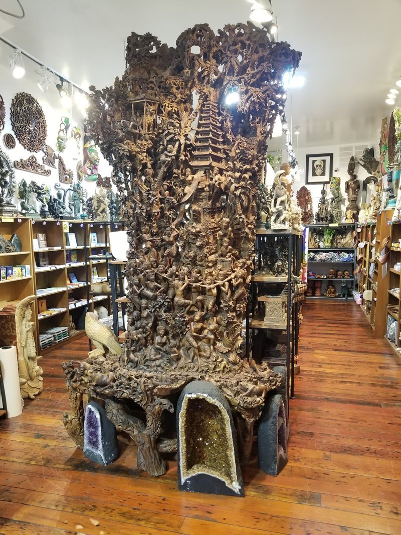 Display of polished crystal specimens, geodes, and mineral towers