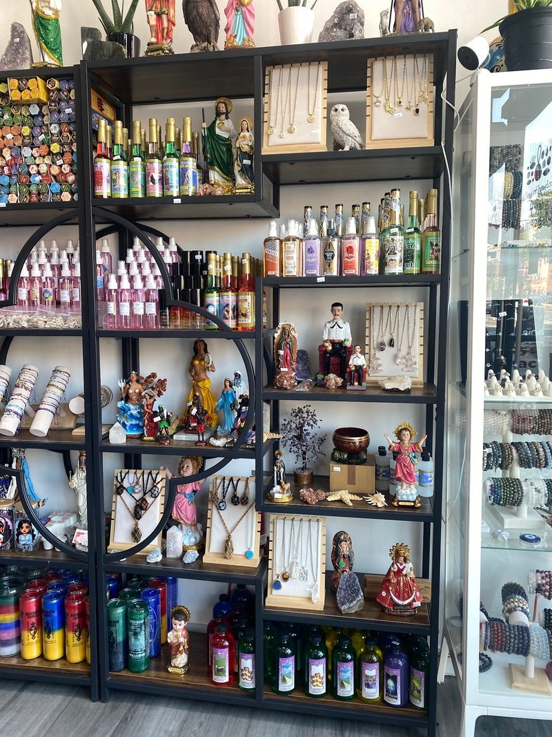 Retail display with tumbled stones, raw crystals, and polished specimens