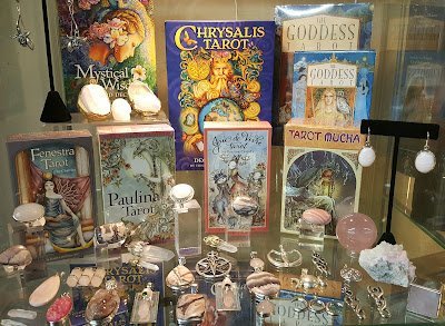 Shop interior featuring gemstones, healing crystals, and spiritual products