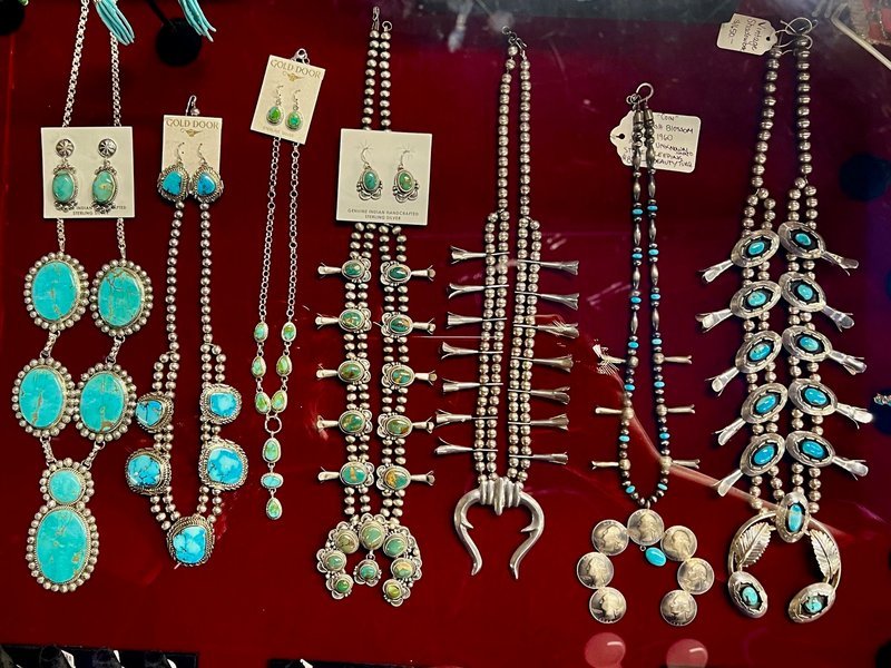 Selection of healing crystals, tumbled stones, and decorative mineral pieces