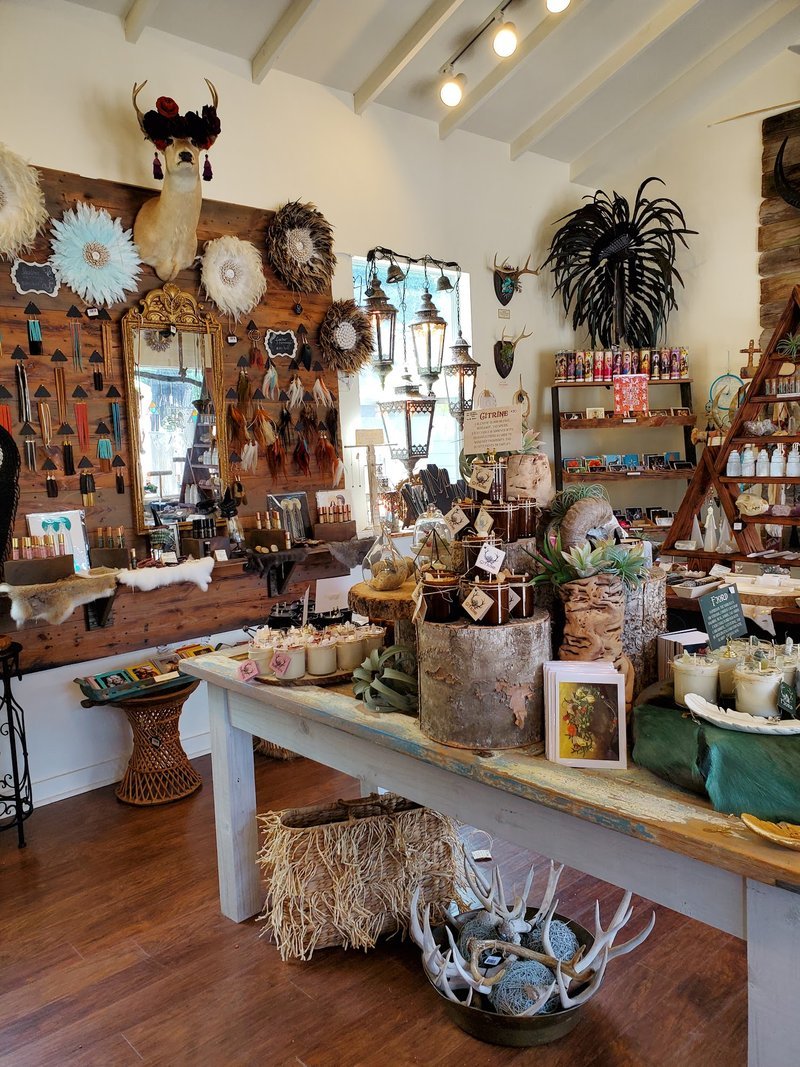 Shop interior featuring gemstones, healing crystals, and spiritual products