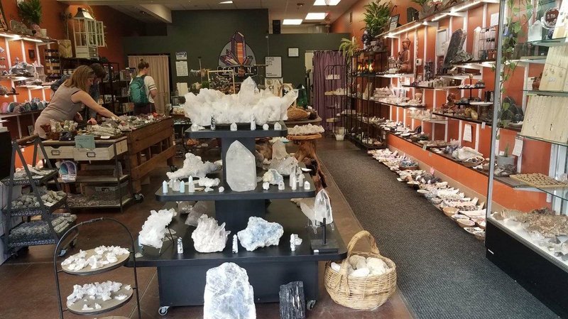 Store interior displaying crystals, minerals, and metaphysical supplies